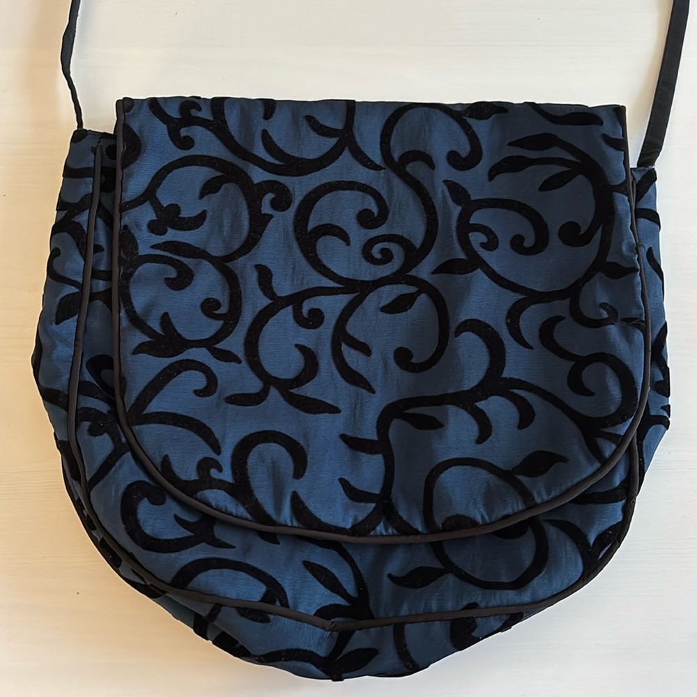 Blue and black purse